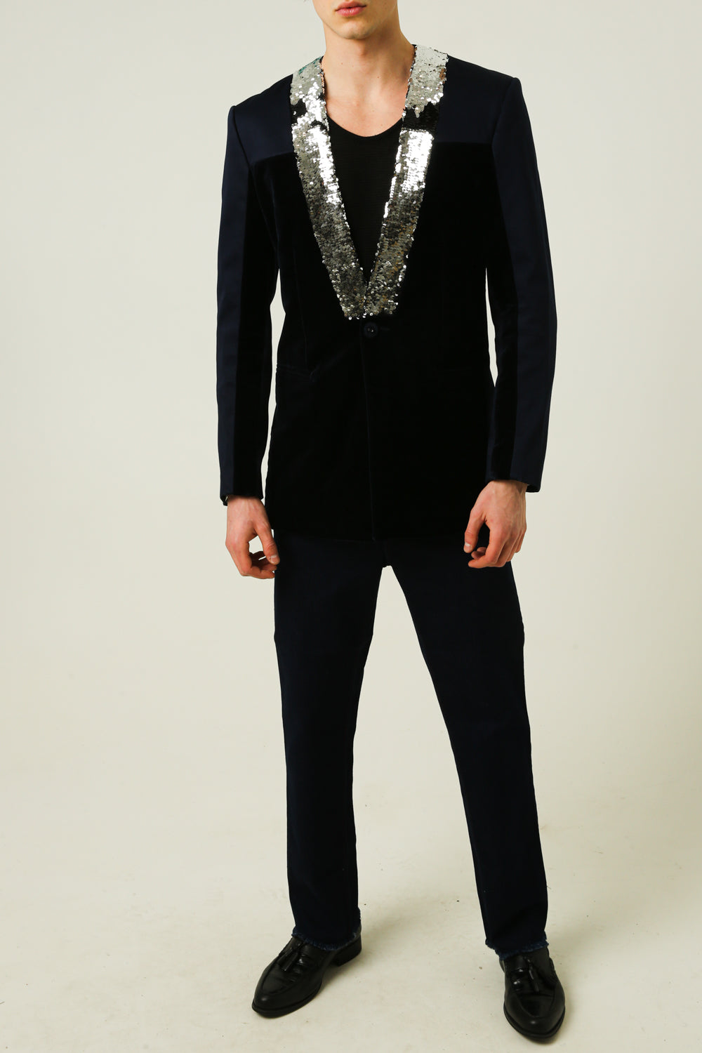 Jacket with collar in contrasting sequins